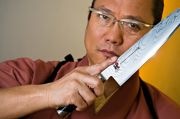 Chef Morimoto posing with signature knife